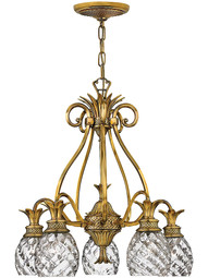 Pineapple 5 Light Chandelier With Optic Glass Shades in Burnished Brass.